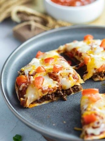 Taco Bell Mexican Pizza on a blue plate.