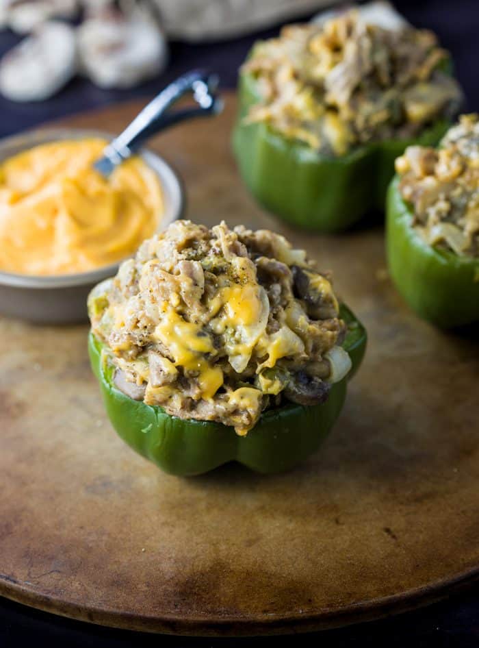 These Philly Cheesesteak Stuffed Peppers are loaded with onions, mushrooms, and thinly shaved steak smothered in warm cheese and tucked inside of a baked bell pepper. Philly Cheesesteak Stuffed Pepper
