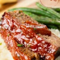 A labeled image of Cracker Barrel Meatloaf with ketchup on top.