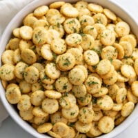 A white bowl filled with Ranch Oyster Crackers.