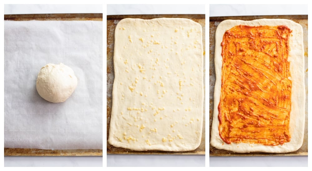 Rolling pizza dough into a rectangle and brushing sauce on it to make Stromboli.