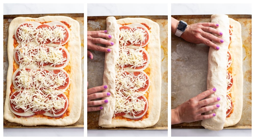 Rolling up Stromboli with Italian cold cuts in the middle.